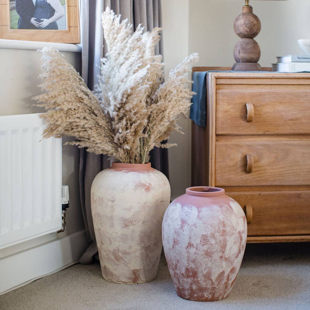 Minimal ceramic vase with soft, natural tones
