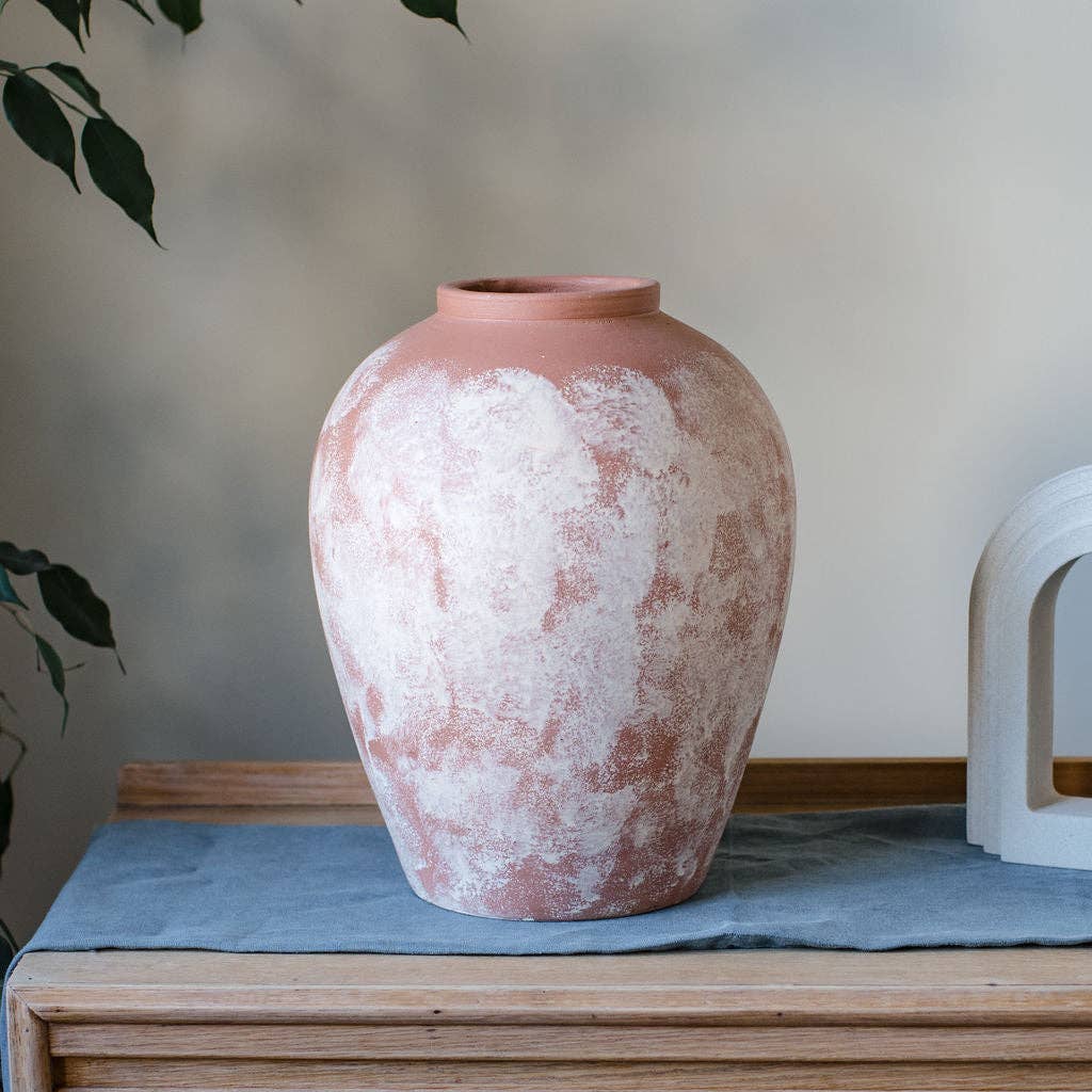 Minimal ceramic vase with soft, natural tones