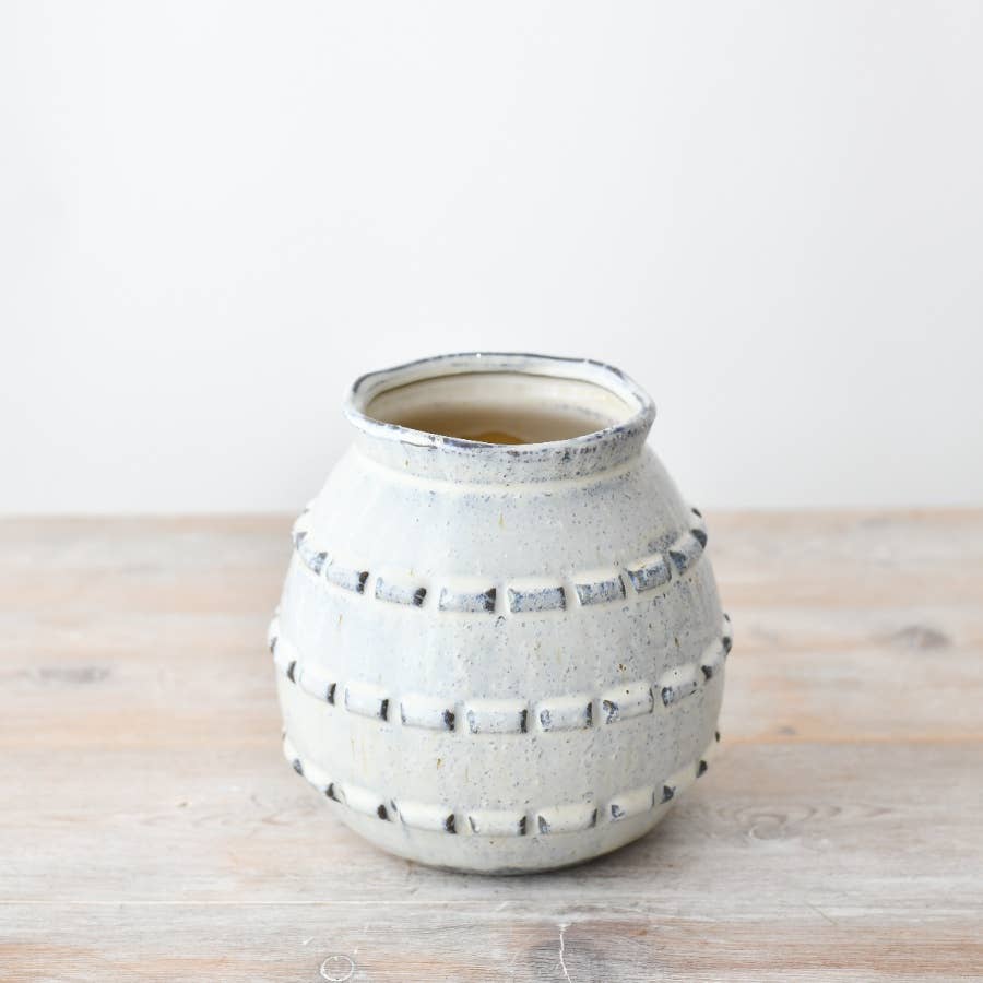 Minimal ceramic vase with soft, natural tones