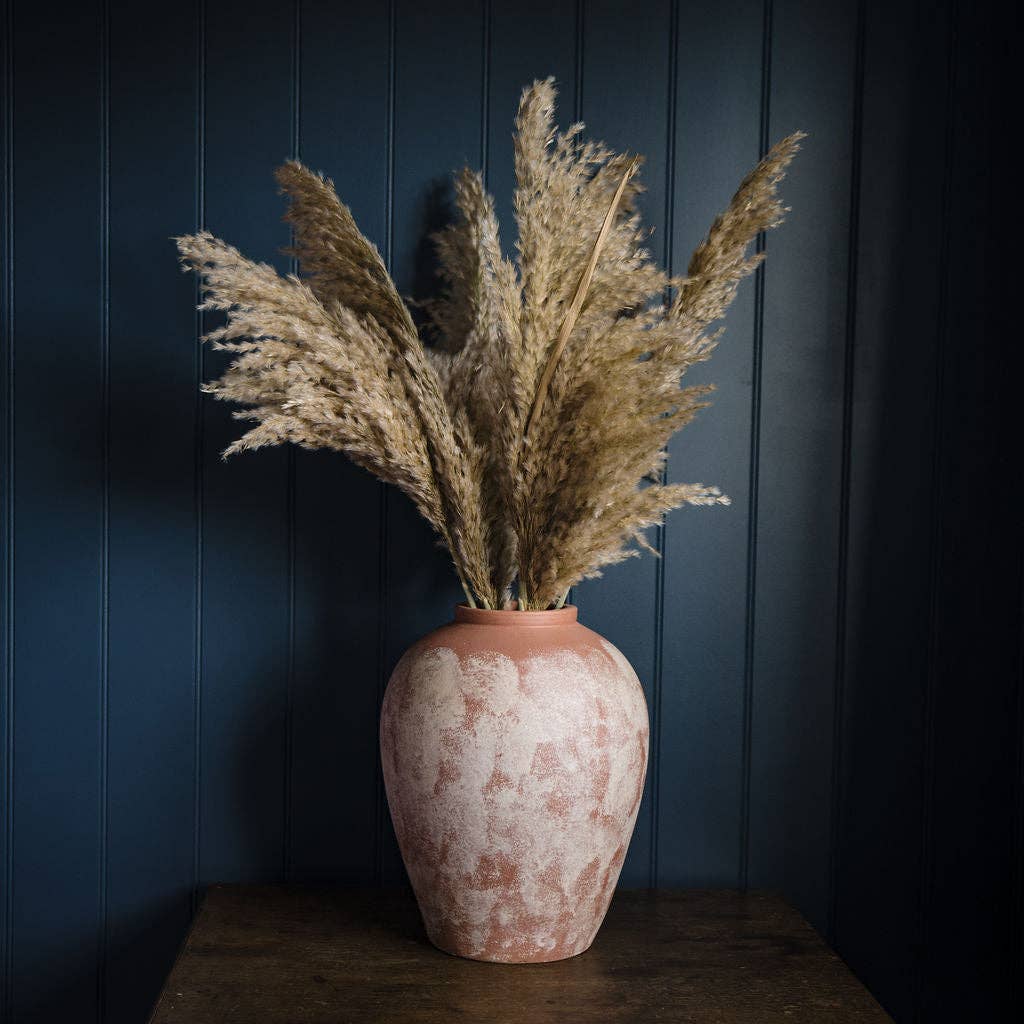 Minimal ceramic vase with soft, natural tones
